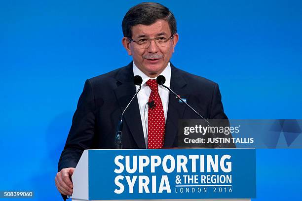 Turkish Prime Minister Ahmet Davutoglu addresses a press conference at the QEII centre in central London on February 4 towards the end of a donors'...