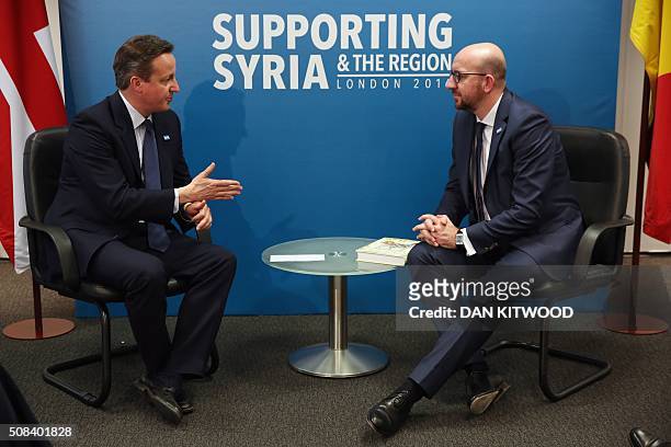 Belgian Prime Minister Charles Michel and British Prime Minister David Cameron hold bilateral talks at the QEII centre in central London on February...