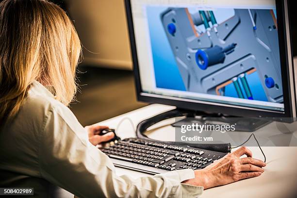 engineer working on desktop computer - computer hardware engineer stock pictures, royalty-free photos & images