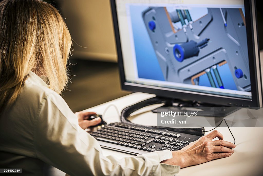 Engineer Working on Desktop Computer