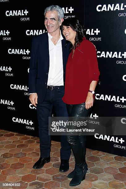 Raymond Domenech and Estelle Denis attend the 'Canal + Animators' Party At Manko on February 3, 2016 in Paris, France.