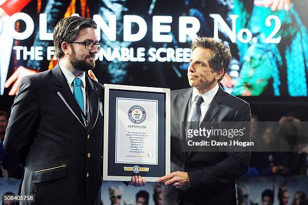 Ben Stiller accepts a certificate after a record breaking selfie during a Fashionable Screening of the Paramount Pictures film "Zoolander No. 2" at...