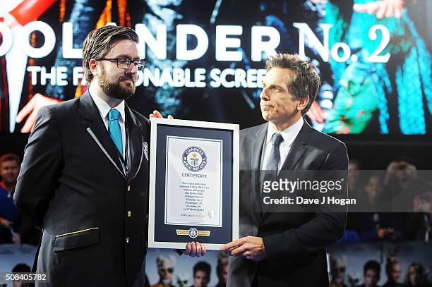 Ben Stiller accepts a certificate after a record breaking selfie during a Fashionable Screening of the Paramount Pictures film "Zoolander No. 2" at...