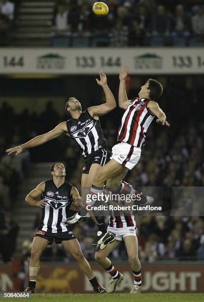 Anthony Rocca of the Magpies challenges Trent Knobel of the Saints during the round eight AFL match between the St.Kilda Saints and the Collingwood...