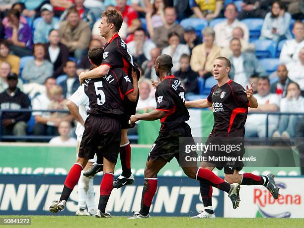 Brian McBride of Fulham celebrates his first goal during the FA Barclaycard Premiership match between Bolton Wanderers and Fulham at The Reebok...