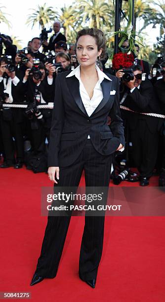 Actress Angelina Jolie arrives 15 May 2004, for the official projection of "Shrek 2" at the Cannes Film Festival in the French Riviera town. The...