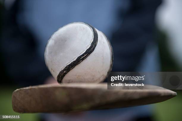 sliothar on hurley - hurley stick stock pictures, royalty-free photos & images