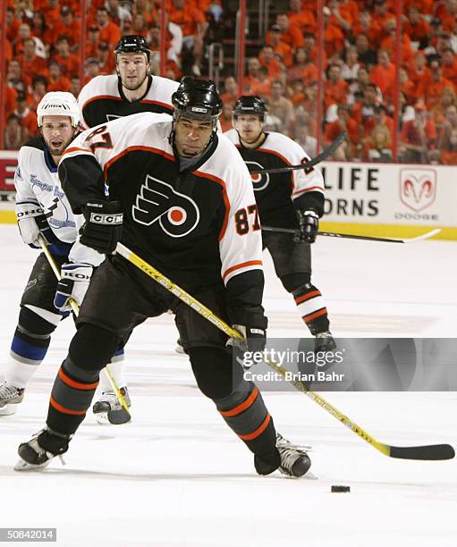 Donald Brashear of the Philadelphia Flyers takes a shot against the Tampa Bay Lightning in Game four of the 2004 NHL Eastern Conference Finals on May...