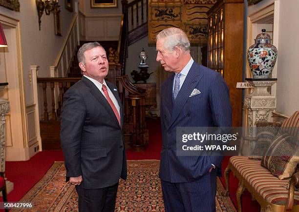 Prince Charles, Prince of Wales greets King Abdullah II of Jordan at Clarence House on February 4, 2016 in London, United Kingdom. The Prince of...