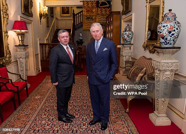 Prince Charles, Prince of Wales greets King Abdullah II of Jordan at Clarence House on February 4, 2016 in London, United Kingdom. The Prince of...