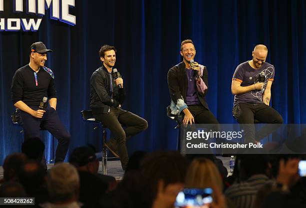 Musicians Jonny Buckland, Guy Berryman, Chris Martin and Will Champion of Coldplay speak onstage at the Pepsi Super Bowl Halftime Press Conference on...