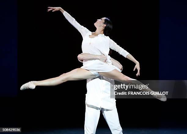 Dancers perform during the rehearsal of "La nuit s'acheve" ballet created by Benjamin Millepied on February 4, 2016 at the Garnier Opera in Paris. /...