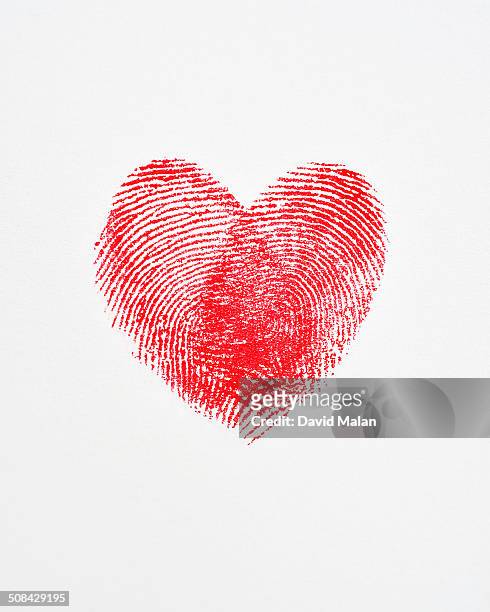 overlapping fingerprints forming a heart shape - fingerprint stock pictures, royalty-free photos & images
