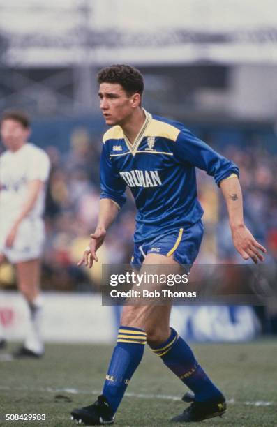 English footballer Vinnie Jones playing for Wimbledon against Tottenham Hotspur in an English FA Cup Sixth Round match at the Plough Lane stadium,...