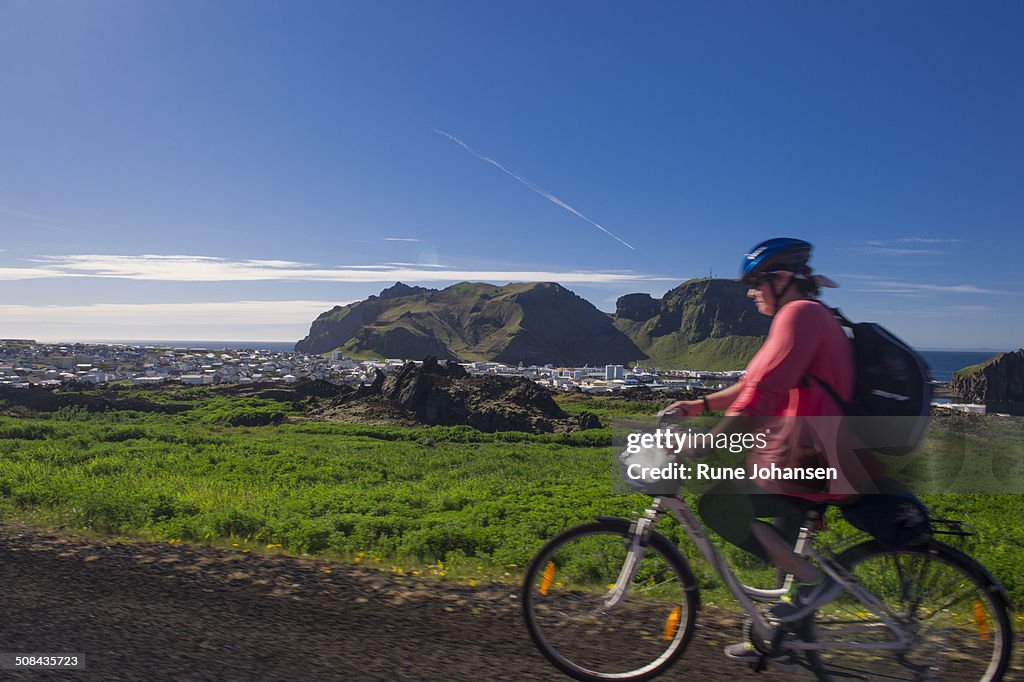 Bicyclist near Vestmannaeyjar