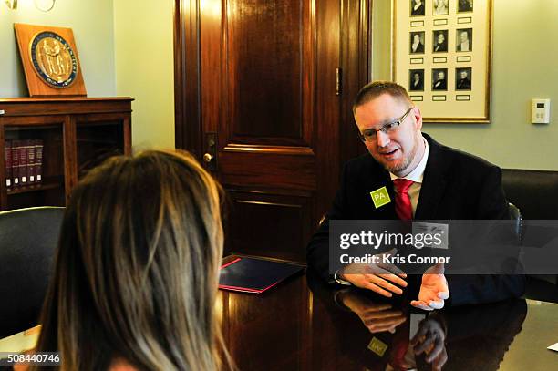 PAs David Lizotte and Joseph Sutherland speak with a member of Sen. Rand Paul’s team in Washington, DC about the need to reform federal law to allow...