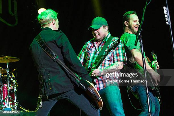 Ben Wells, Chris Roberston and Jon Lawhon of Black Stone Cherry perform at SSE Arena Wembley on February 4, 2016 in London, England.