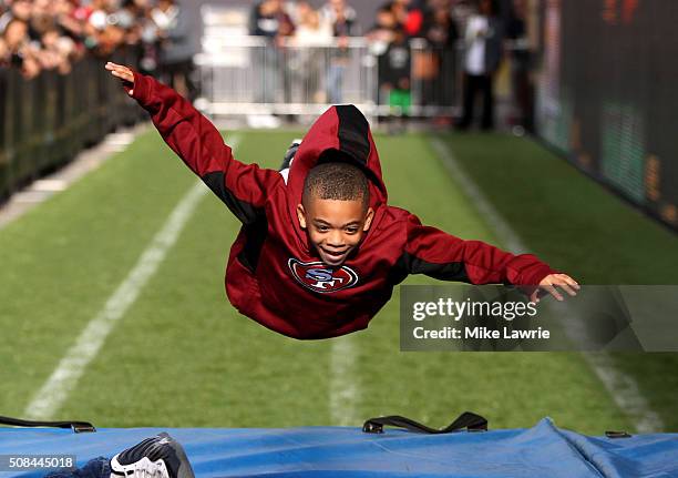 Fan dives after running the 40 yard dash at The 50th Mile on Market Street prior to Super Bowl 50 on February 4, 2016 in San Francisco, United States.