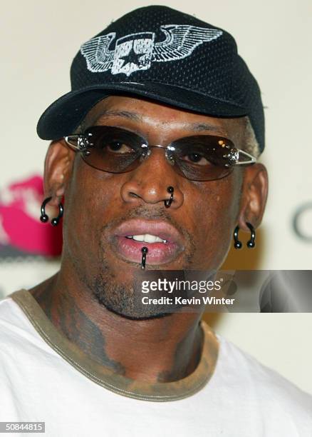 Former NBA Player Dennis Rodman arrives at The 11th Annual "Race to Erase MS" at the Century Plaza Hotel on May 14, 2004 in Los Angeles, California.