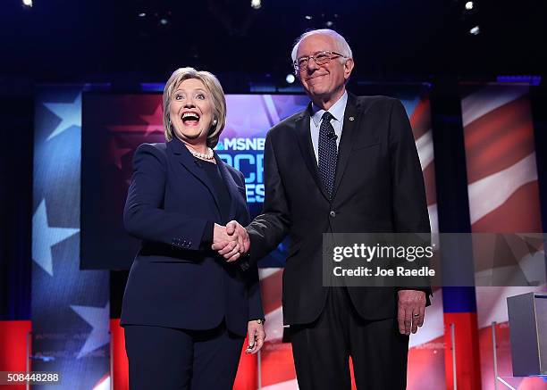 Democratic presidential candidate former Secretary of State Hillary Clinton and U.S. Sen. Bernie Sanders shake hands at the start of their MSNBC...