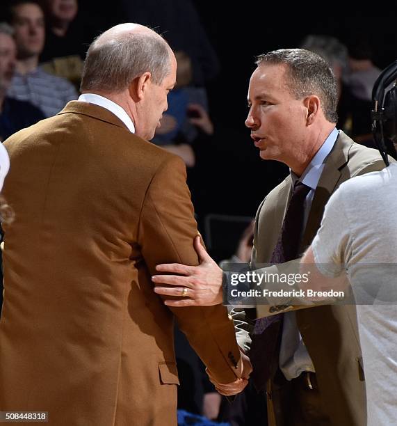 Head coach Kevin Stallings of the Vanderbilt Commodores shakes the hand of head coach Billy Kennedy after a 77-60 Vanderbilt upset of Texas A&M at...