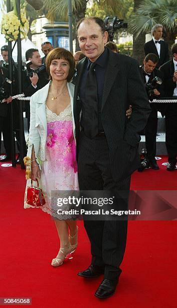 Actors Ariane Ascarides and Jean Pierre Daroussin attend the premiere of movie "Comme Une Image" at the Palais des Festivals on May 16, 2004 in...