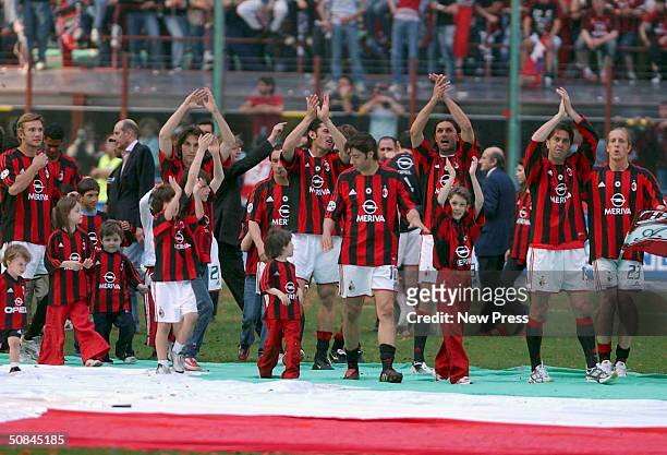 Milan celebrate after winning the Serie A match between AC Milan and Brescia on May 16, 2004 in Milan, Italy.