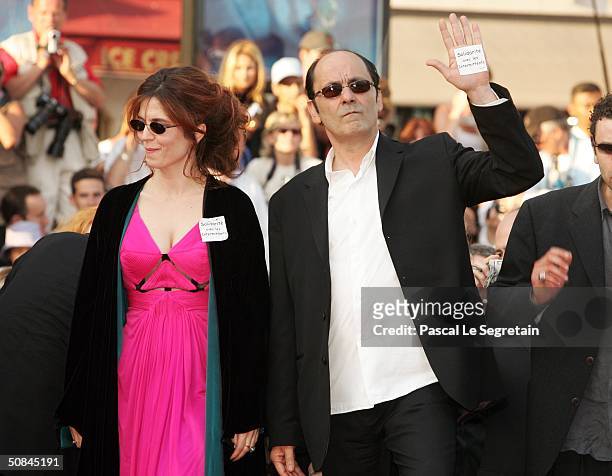 Actor Jean-Pierre Bacri and director Agnes Jaoui attend the premiere of movie "Comme Une Image" at the Palais des Festivals on May 16, 2004 in...