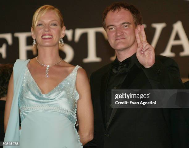 Actress Uma Thurman and Director Quentin Tarantino arrives at the premiere of "Kill Bill II" at the Palais des Festivals during the 57th Annual...