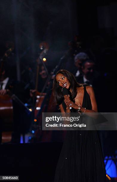 Naomi Campbell on stage at "We are the Future" benefit concert produced by music legend Quincy Jones May 16, 2004 in Rome, Italy.