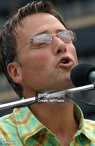 Christian musician Michael W. Smith sings at the launch of The "One" Campaign to Fight Global Aids and Poverty May 16, 2004 in Philadelphia,...
