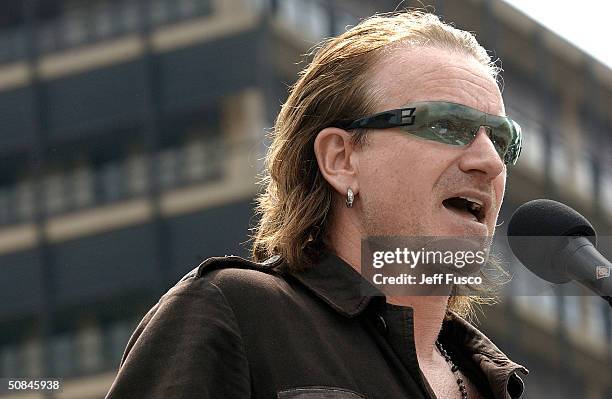 S Bono speaks at the launch of The "One" Campaign to Fight Global Aids and Poverty May 16, 2004 in Philadelphia, Pennsylvania. Activists including...