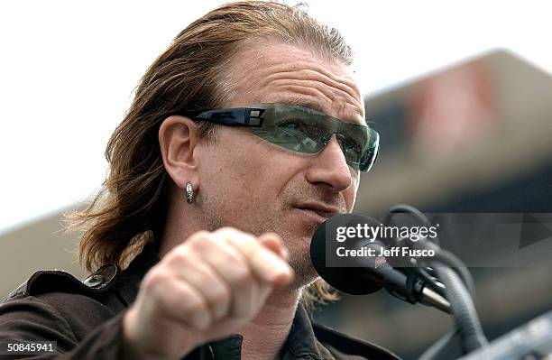 S Bono speaks at the launch of The "One" Campaign to Fight Global Aids and Poverty May 16, 2004 in Philadelphia, Pennsylvania. Activists including...