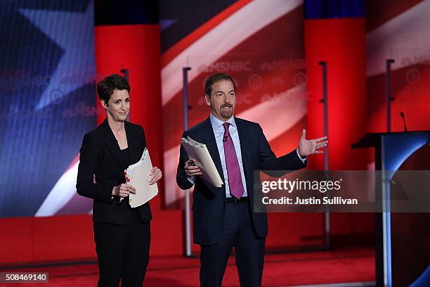 Debate moderators Rachel Maddow and Chuck Todd prepare for the start of the MSNBC Democratic Candidates Debate between Democratic presidential...