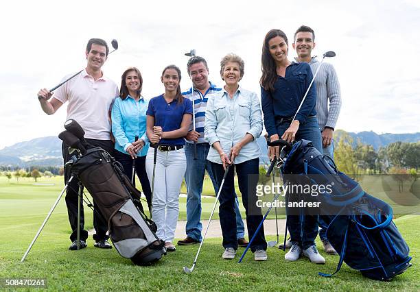 group of people playing golf - golf lessons stock pictures, royalty-free photos & images