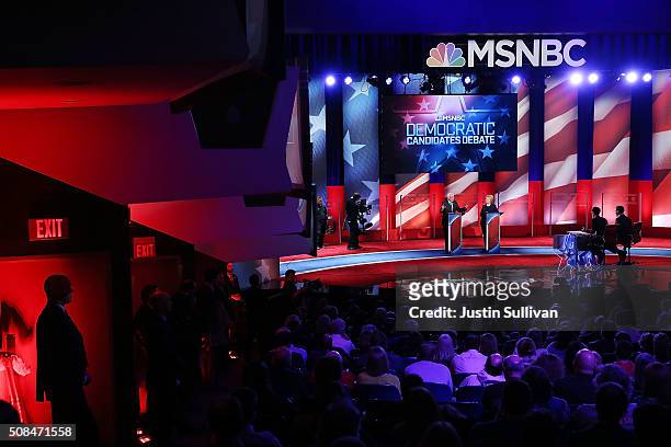Democratic presidential candidates former Secretary of State Hillary Clinton and U.S. Sen. Bernie Sanders are asked questions by moderators Rachel...