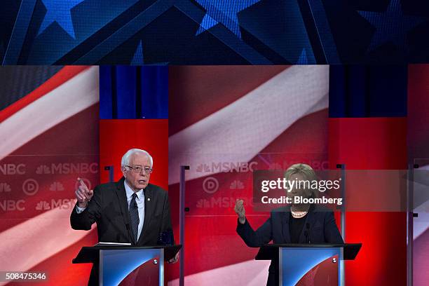 Democratic presidential candidates Hillary Clinton, former Secretary of State, right, and Senator Bernie Sanders, an independent from Vermont, speak...