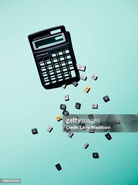 calculator with broken buttons over blue background - broken calculator stock pictures, royalty-free photos & images