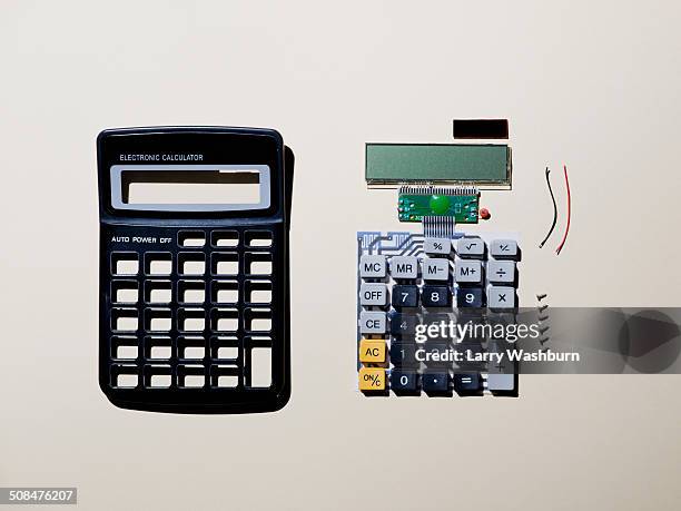 calculator components over gray background - broken calculator stock pictures, royalty-free photos & images