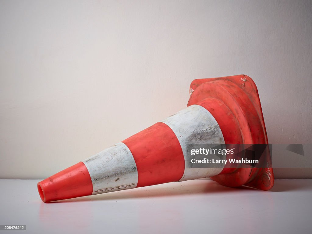 Traffic cone fallen on floor