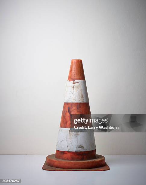 traffic cone on floor - safety cone stock-fotos und bilder