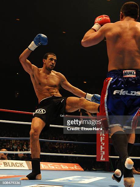 Badr Hari and Peter Aerts compete in the quarter final of the K-1 World GP 2008 Final at the Yokohama Arena on December 6, 2008 in Yokohama,...