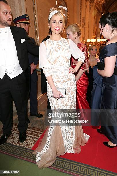 Silvia Schneider, girlfriend of Andreas Gabalier, wearing a white dress designed by herself during the Opera Ball Vienna 2016 at Vienna State Opera...