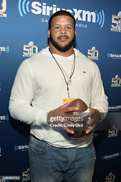 Aaron Donald of the St. Louis Rams visits the SiriusXM set at Super Bowl 50 Radio Row at the Moscone Center on February 4, 2016 in San Francisco,...