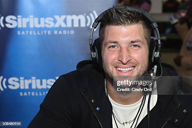 Free agent professional football player Tim Tebow visits the SiriusXM set at Super Bowl 50 Radio Row at the Moscone Center on February 4, 2016 in San...