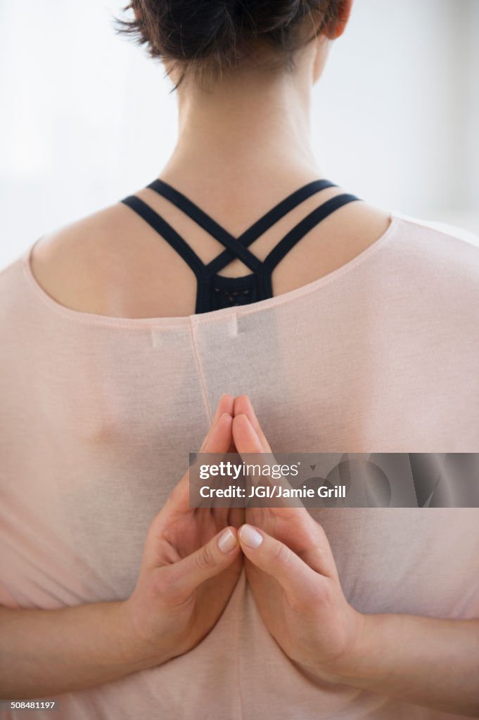 Caucasian woman practicing yoga