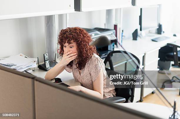 hispanic businesswoman working in office - answering email stock pictures, royalty-free photos & images