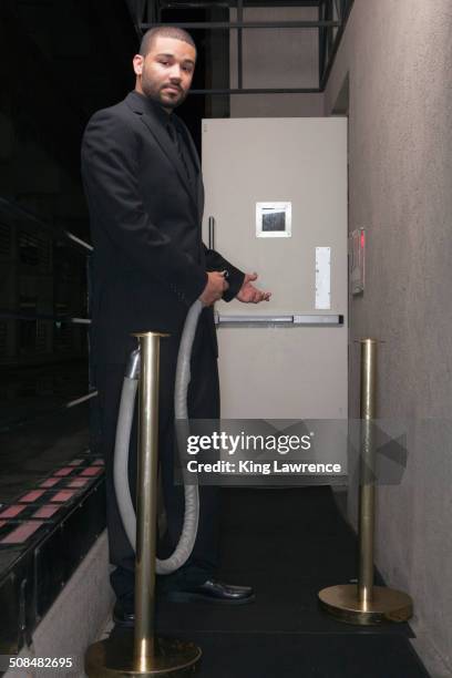 african american bouncer working at nightclub - nightclub security stock pictures, royalty-free photos & images