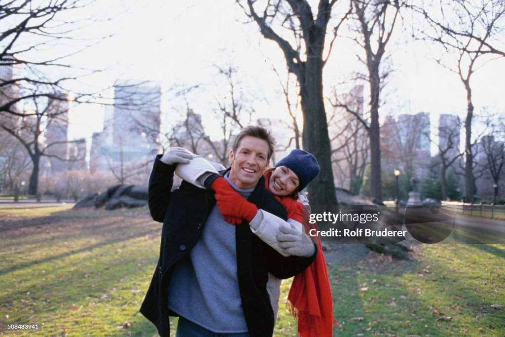 Couple hugging in Central Park, New York City, New York, United States