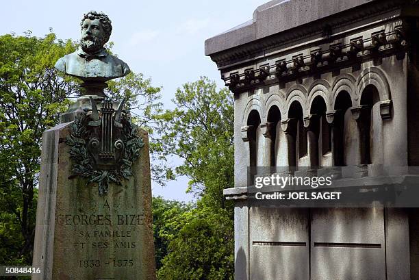 Photo taken 14 May 2004 of French musician Georges Bizet's gravestone with the silence sculpture at Pere Lachaise Cemetery in Paris. Pere Lachaise is...